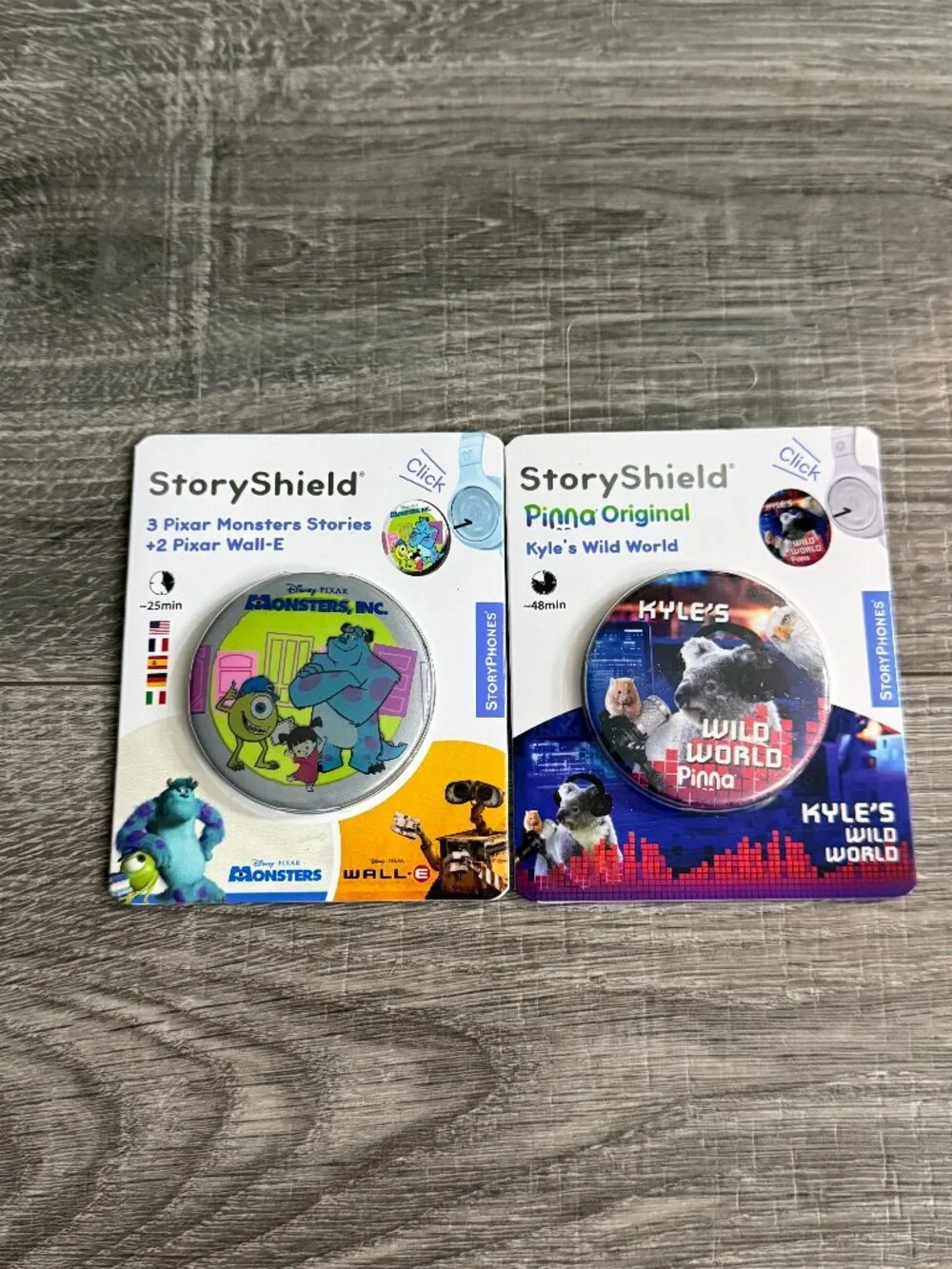 NIP StoryShield Headphones Lot Of 2 Disney Monsters Inc & Kyles Wild World